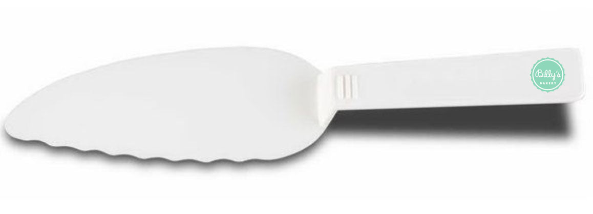 White plastic cake server with a serrated edge and a "Billy's Bakery" logo in a green circle on the handle.
